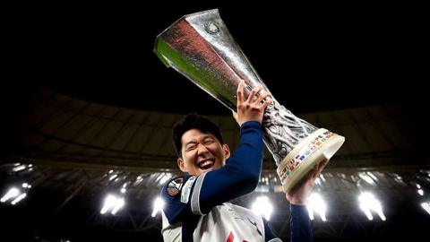 Former Tottenham captain Son Heung-min lifting the Europa League trophy