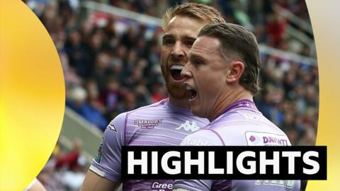 Highlights graphic showing Wigan players celebrating