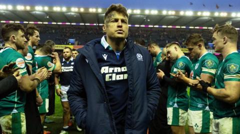 Scotland's Jack Dempsey is applauded off by Ireland