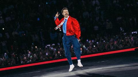 Harry Styles performs on stage during his Together, Together Tour.