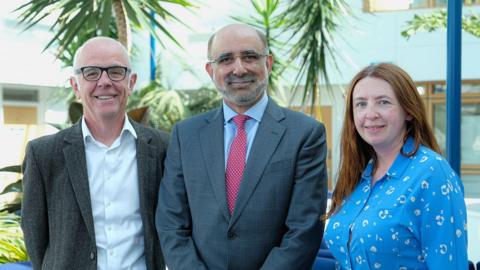 MSG Chair Dr Steve Evans, CEO Dr Farid Fouladinejad and Depuy chair Dr Michelle Le Cheminant. They are stood in a line smiling at the camera. 