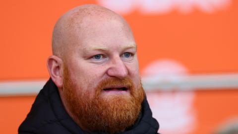 Andy Whing watching his Barrow team lose their EFL Trophy game at Blackpool