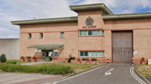 Exterior of the brick-built entrance to HMP Altcourse