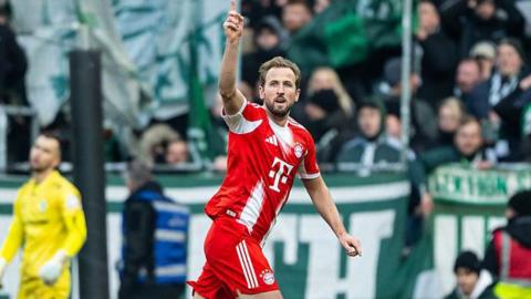 Harry Kane celebrates scoring for Bayern Munich