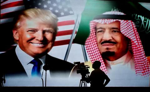 A large picture of Donald Trump and Saudi King Salman at a summit in Riyadh in 2017. 