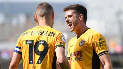 Newport County's Shane McLoughlin and Ollie Greaves celebrate