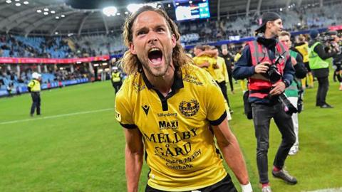 Mjallby players celebrate after the 2-0 win against IFK Gothenburg on Monday which clinched the Allsvenskan title