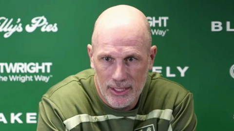 Norwich City head coach Philippe Clement speaks to the media at a press conference