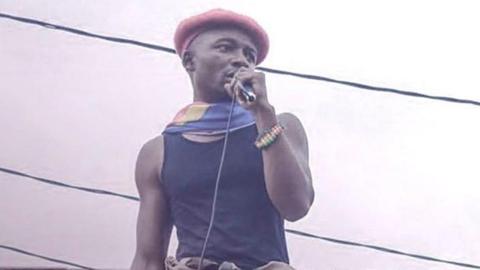 Delcat Idengo on stage in a previous performance 