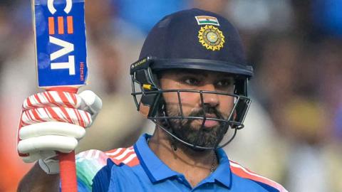 Rohit Sharma celebrates his half-century