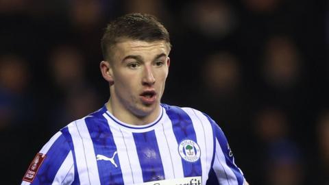 Charlie Hughes in action for Wigan Athletic last season