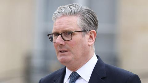British Prime Minister Keir Starmer leaves after the multinational virtual summit and press conference at the Elysee Presidential Palace on April 17, 2026.