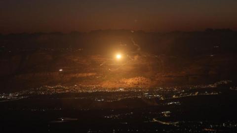 Israel's Iron Dome air defense system intercepts projectiles fired from southern Lebanon