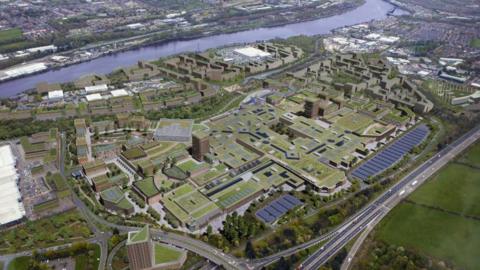 A CGI depicting an aerial view of how Metro Riverside will look. The shopping centre is covered in greenery and has solar panels on its roof. Buildings and homes are located around the centre and near the River Tyne.