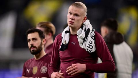 Manchester City players look disappointed after losing to Juventus 