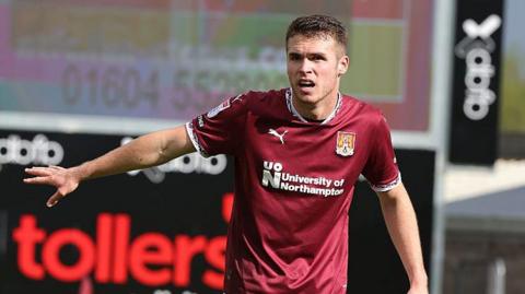 Northampton Town defender Max Dyche in action.