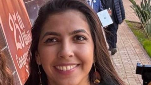 A woman - Vitoria Figueiredo Barreto - smiling straight at the camera.