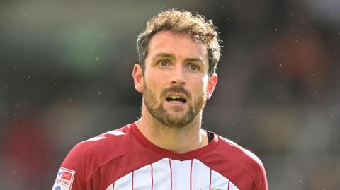 Danny Hylton in action for Northampton Town versus Gillingham in April 2023