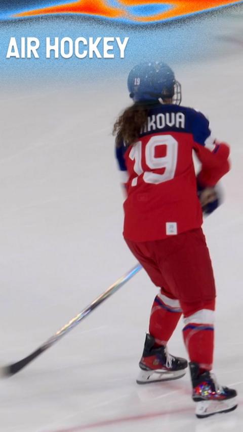 Czechia women's ice hockey player warms up without a puck