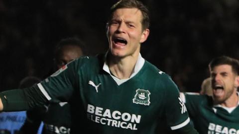 Mathias Ross celebrates scoring for Argyle