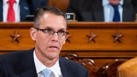 File image of Randy Feenstra. He wears a suit as he attends a hearing in the US House