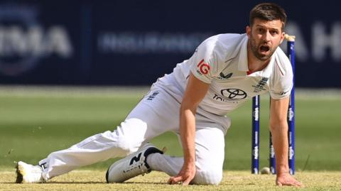 Mark Wood looks shocked having fallen over in the follow-through to bowling a delivery in the first Ashes Test in Perth