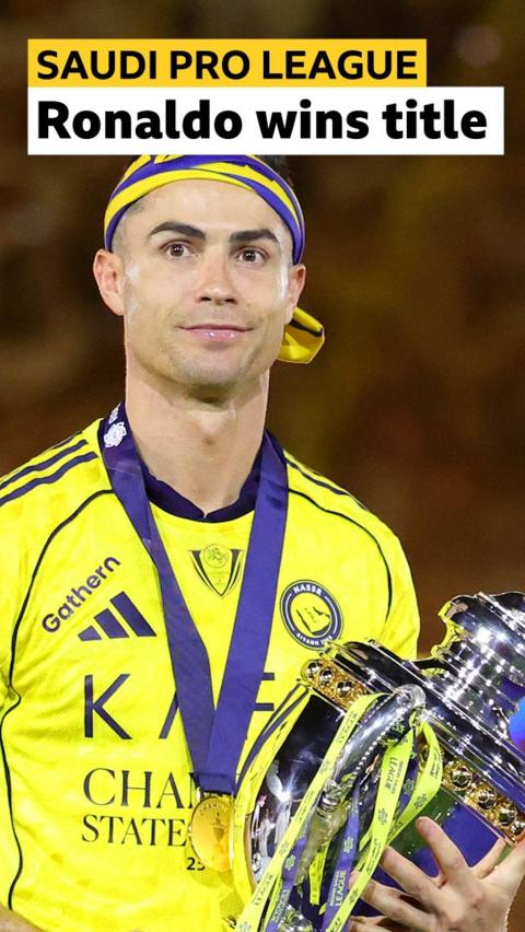 Cristiano Ronaldo holds up Saudi Pro League trophy
