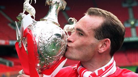 Gary Bennett of Wrexham kisses the Welsh Cup 