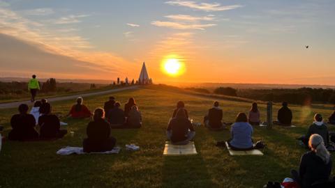 People watching the sunrise in Milton Keynes