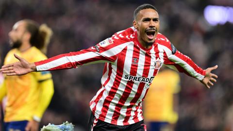 Wilson Isidor celebrates scoring Sunderland's second against Derby