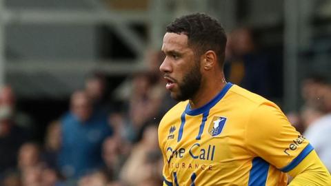 Tyler Roberts in action for Mansfield Town