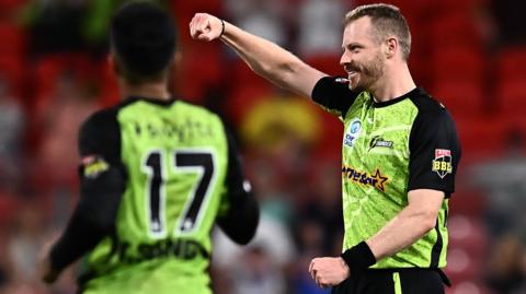 Sydney Thunder bowler Nathan McAndrew celebrates a wicket