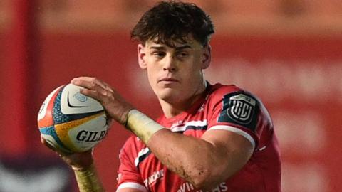 Eddie James takes the ball for Scarlets