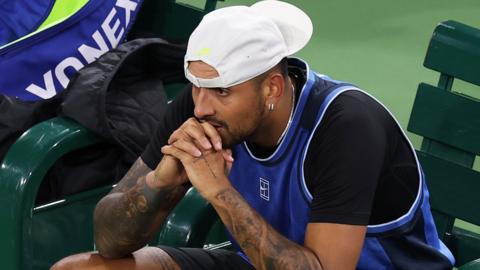 A tearful Nick Kyrgios waits for the trainer at Indian Wells