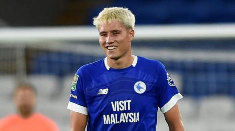 Cardiff City's attacking midfielder Rubin Colwill smiles after scoring a goal