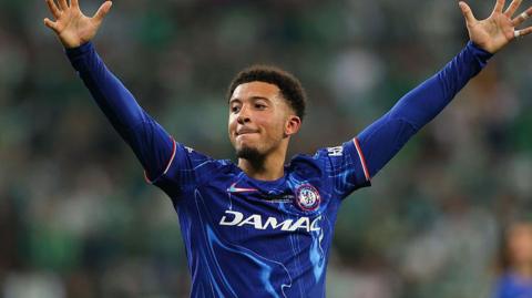 Jadon Sancho celebrates Chelsea's Europa Conference League win