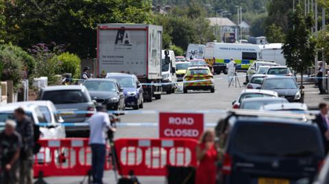 Image shows police tape in Southport on the day of the attack, 29 July 2024