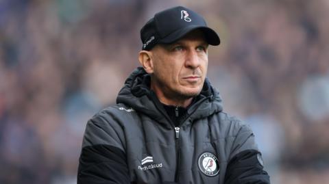 Gerhard Struber stands with his arms folded during Bristol City's match with Coventry