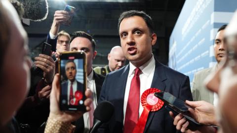Anas Sarwar speaks to the media as election results start coming in