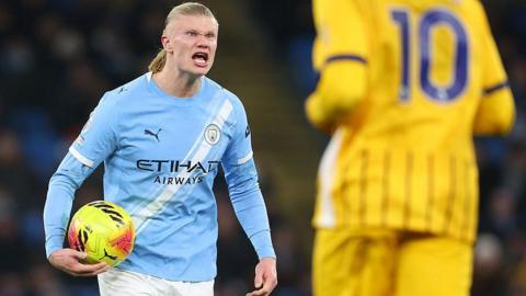 Erling Haaland looking frustrated during Manchester City's game against Brighton