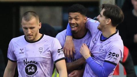 Reeco Hackett-Fairchild celebrates