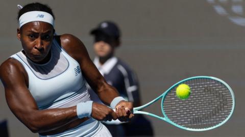 Coco Gauff playing a backhand