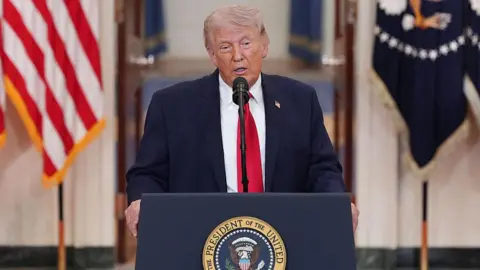 U.S. President Donald Trump speaks from the Cross Hall of the White House on April 1, 2026 in Washington, DC. Trump used the prime-time address to update the nation on the war in Iran. 