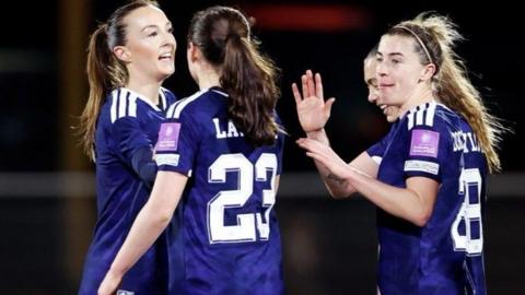 Scotland celebrate Caroline Weir's goal
