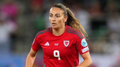 Kayleigh Barton in action for Wales