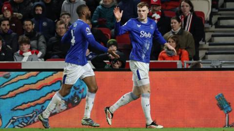 Everton's Jake O'Brien celebrates scoring with team-mate Beto.