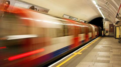 Tube train in motion