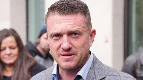 Tommy Robinson outside court