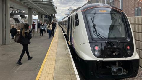 Elizabeth line train on platform at Abbey Wood station