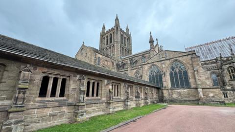 The exterior of Hereford Cathedral, as viewed from outside St John's Walk which links the main cathedral building to the College Cloisters.